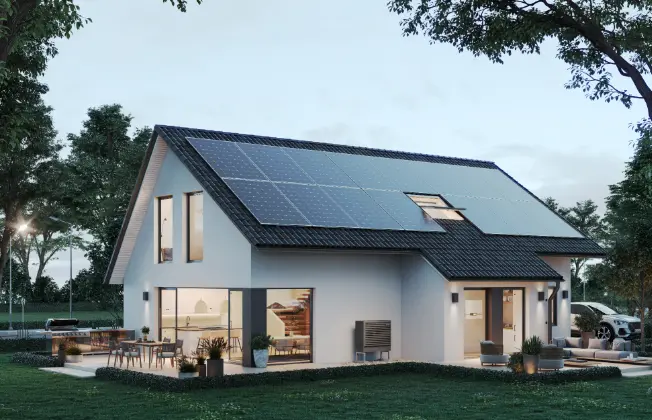 Newly built single-family home with an EcoTouch Air Bloc outdoor unit and a wall-mounted control unit visible inside through the window.
