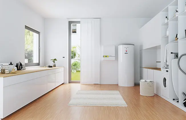 Bright, modern utility room featuring an elegantly integrated Waterkotte EcoStock storage unit and a wall-mounted Waterkotte indoor unit.