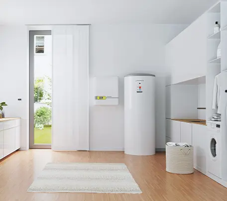 Bright, modern utility room featuring an elegantly integrated Waterkotte EcoStock storage unit and a wall-mounted Waterkotte indoor unit.