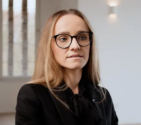 Close-up of the face of a satisfied customer from an interview.