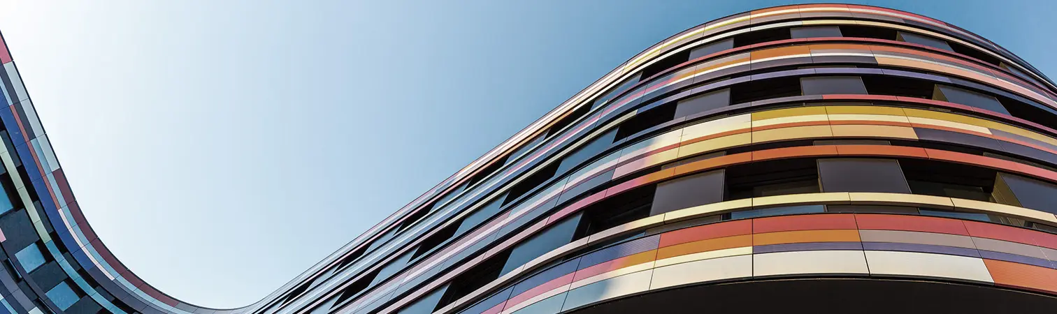 A Waterkotte reference project: view of the BSU building in Hamburg, distinguished by its colorful, curved facade
