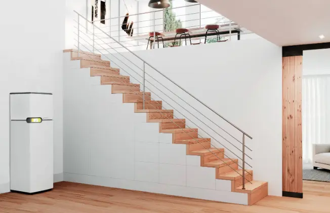 Indoor-installed geothermal heat pump in a modern, well-appointed living space.