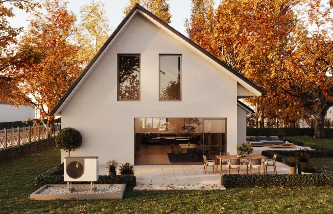Außeneinheit der Basic Line Air Bloc steht an einem Herbsttag vor einem neuen Einfamilienhaus.
