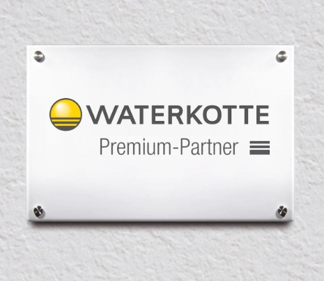 Sign attached to the wall with the inscription "Premium-Partner"