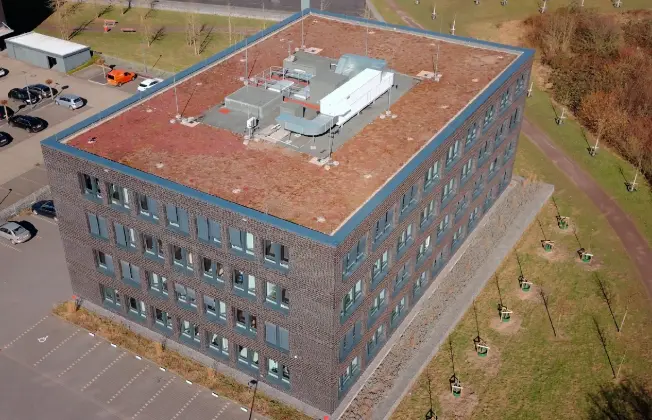 Drone view of the administrative building with a view of the green roof.